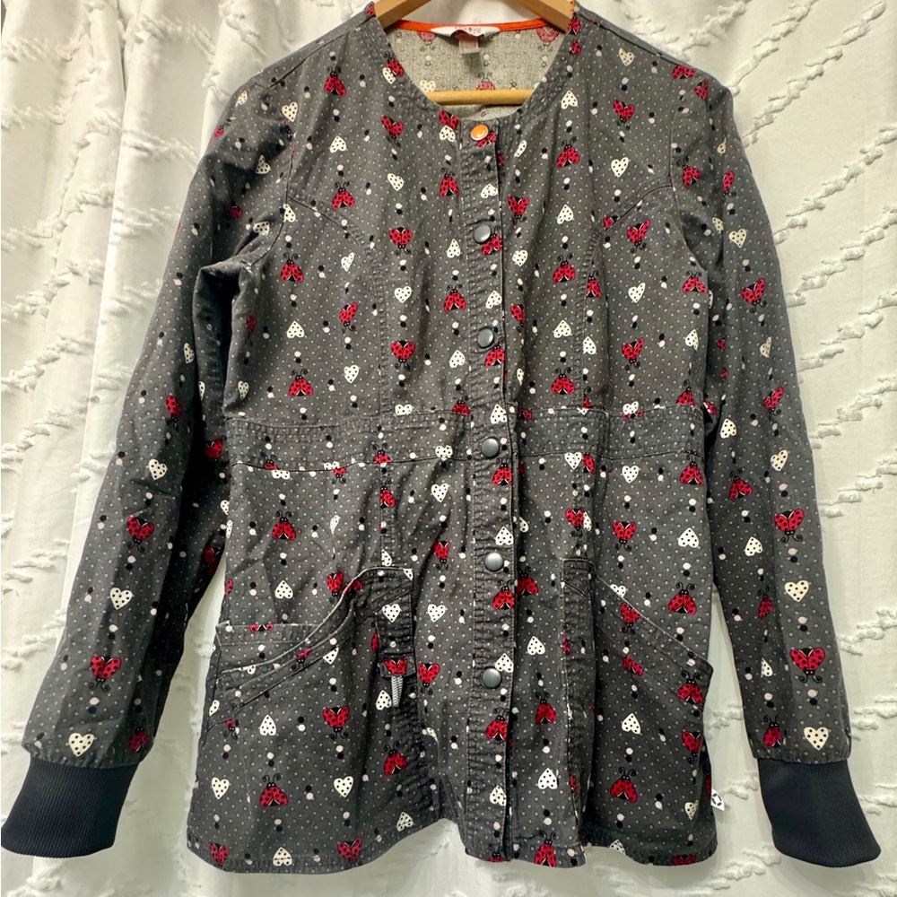 Code Happy M Gray Ladybug Print Scrub Jacket with Orange Accents